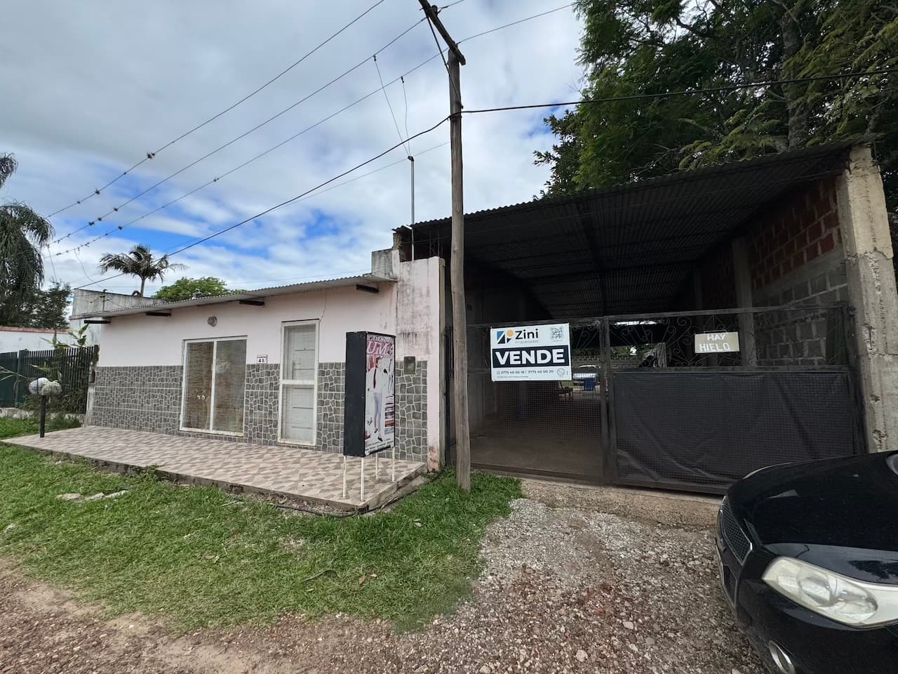 Casa con local y amplio tinglado